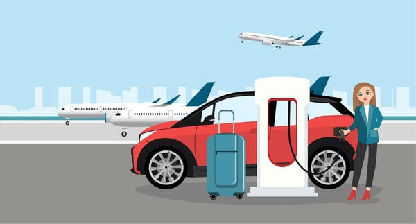 woman charging her vehicle with luggage and airplanes taking off in background 226347239 (1)