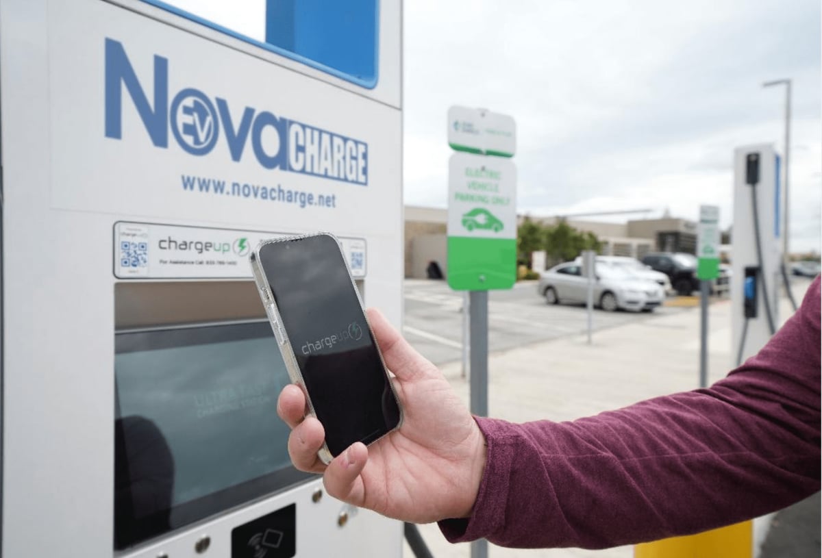 Driver connects to EV charging network to charge EV